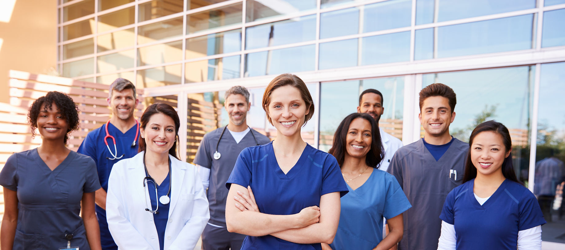 Team of healthcare workers with ID badge